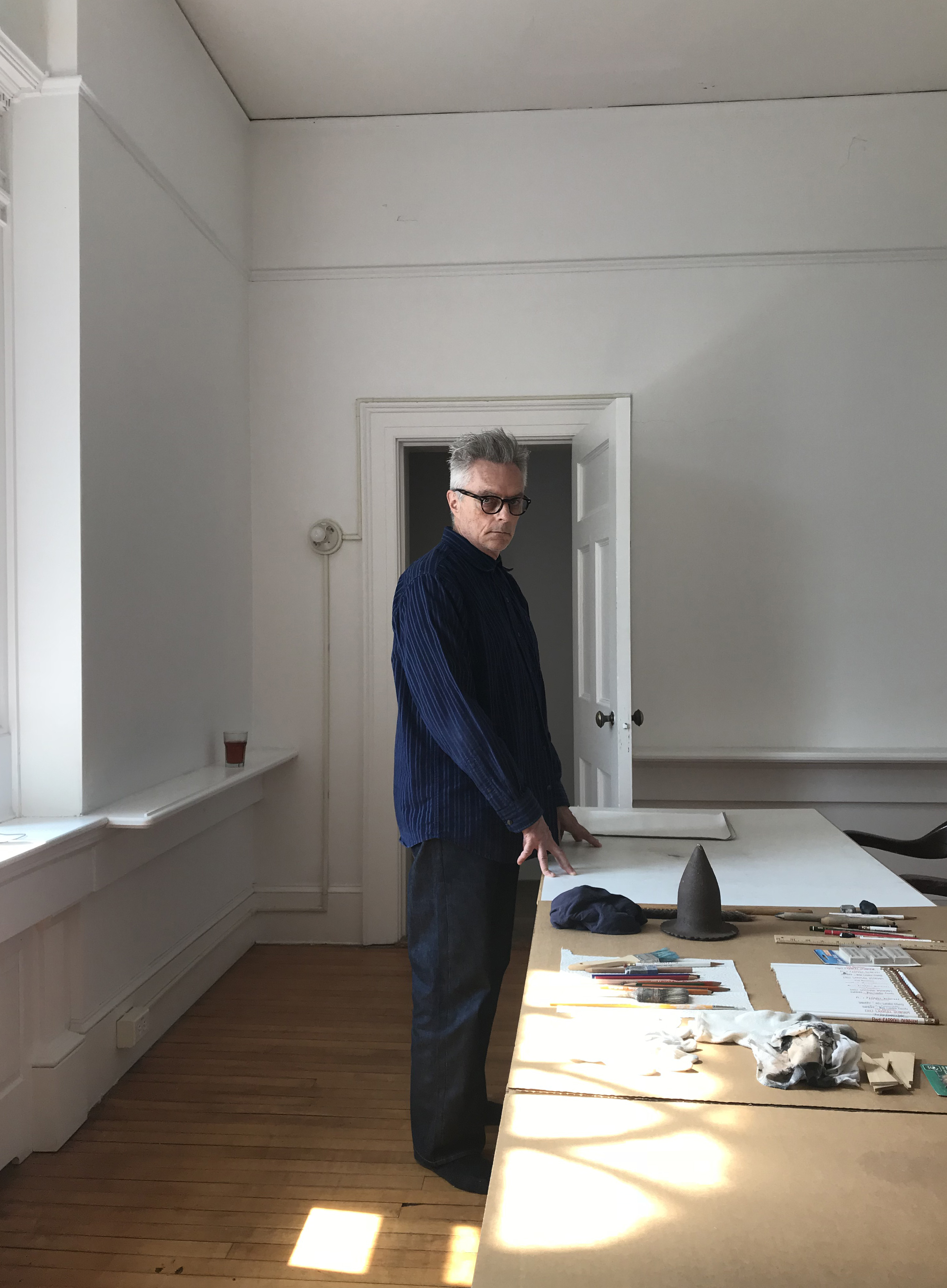 Carroll Dunham in his drawing studio. Photograph by Laurie Simmons.