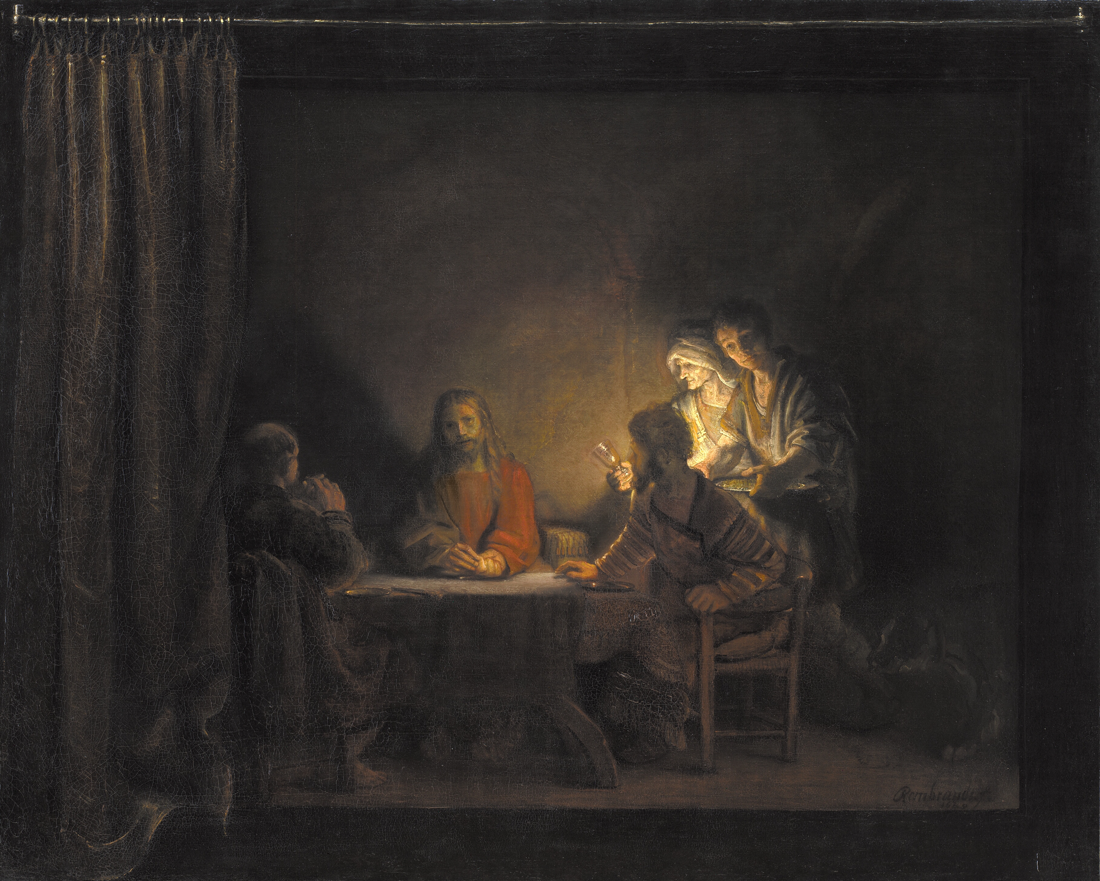 A painting shows three men seated at a table inside an unspecified dark interior with a large, heavy curtain pushed to the left. Jesus sits in the center facing the viewer, wearing a red robe. To his left is a young man with his back mostly turned to the viewer, and to the right is a young man sitting in profile. A young servant stands offering a tray to the table accompanied by an older woman carrying a candle that creates a dramatic lighting effect. In the darkness behind the servant, one can just make out a large dog.