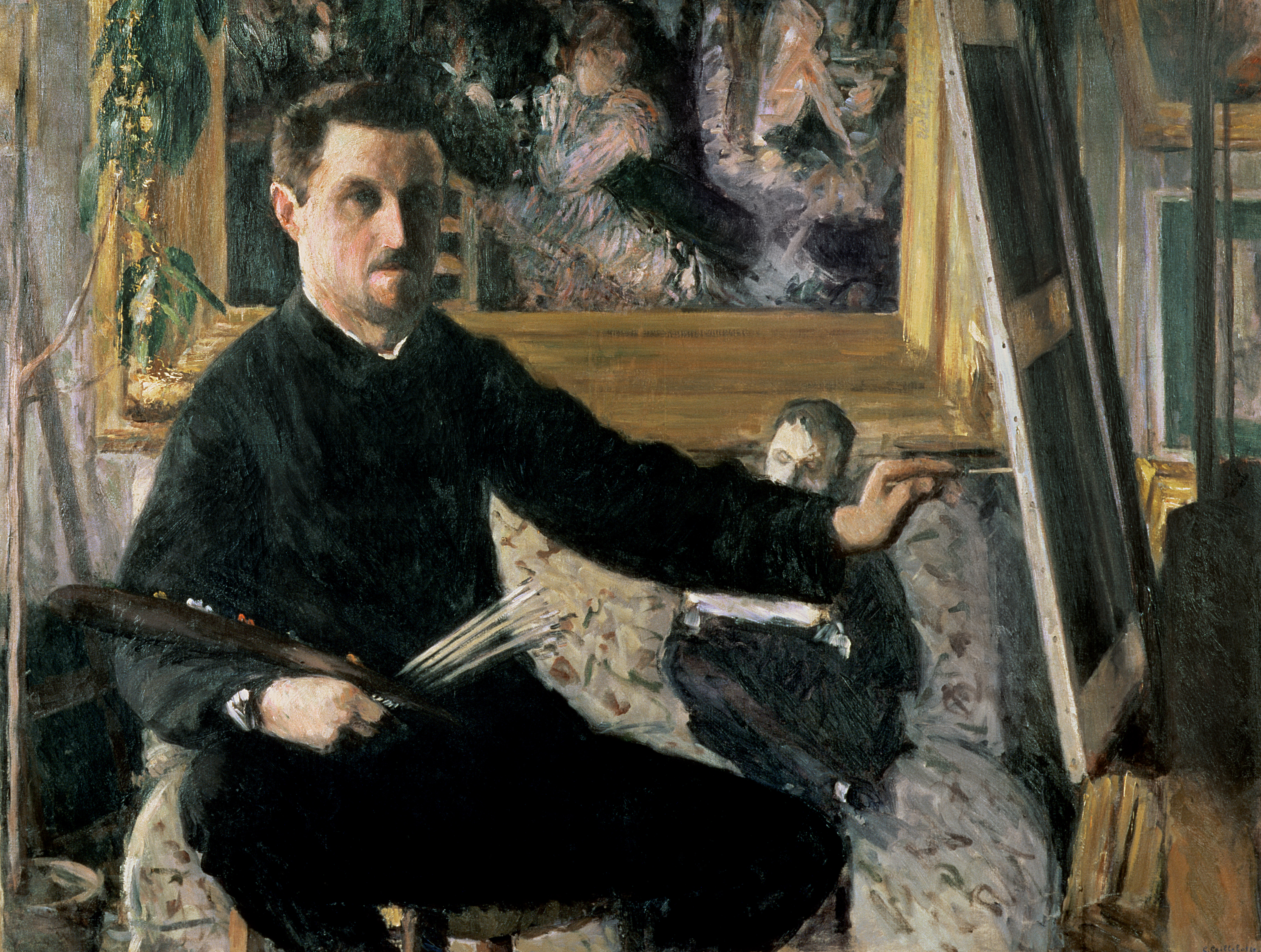 Painting of a young man, Gustave Caillebotte, seated at an easel, facing the viewer. He holds a paintbrush and reaches toward a canvas at right that is turned away from us. Behind him is a large, finished oil painting and a man seated on upholstered furniture.