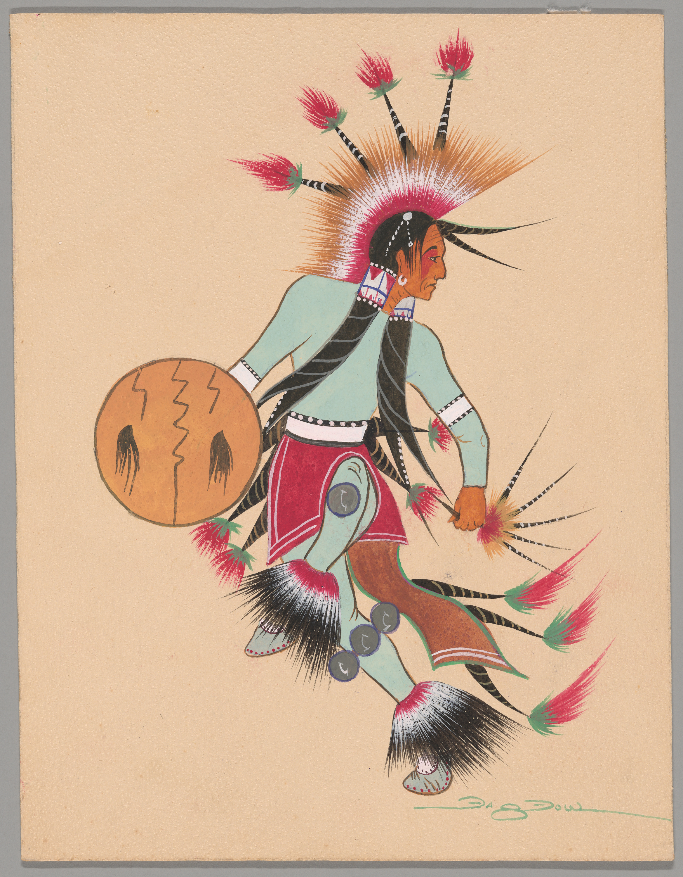 An image of an Indigenous American man in a traditional costume dancing. He wears an elaborate multicolored feather headdress, with complimentary feather adornment at his ankles and as trim to a fabric panel that hangs from his waist. His long hair is worn in two side braids with hair ornaments, and he carries a round shield. He lifts his left knee, stepping across his body and looking back over his left shoulder.