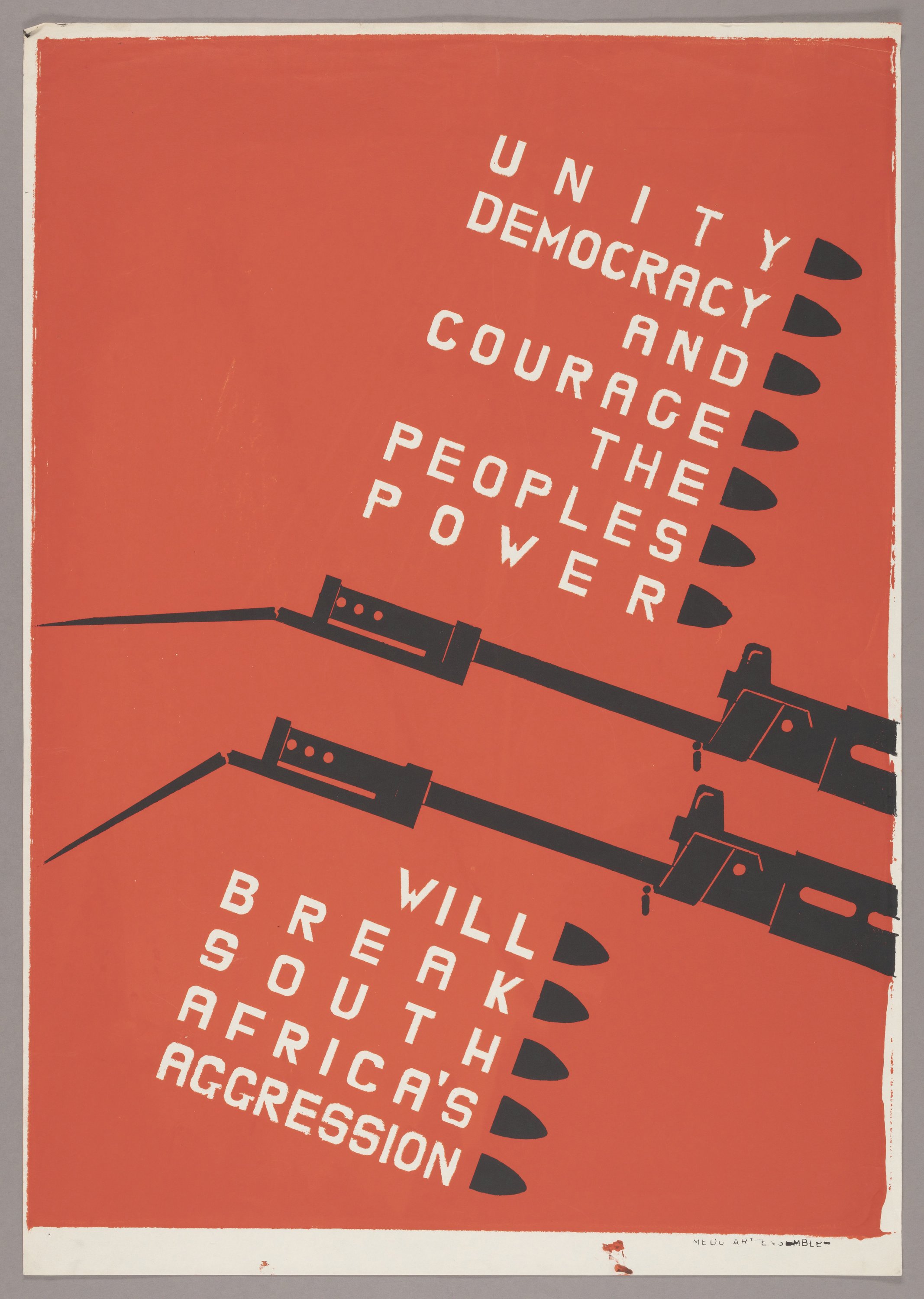 A red poster that reads "Unity Democracy and Courage The Peoples Power" and "Will Break South Africa's Aggression" in white lettering.