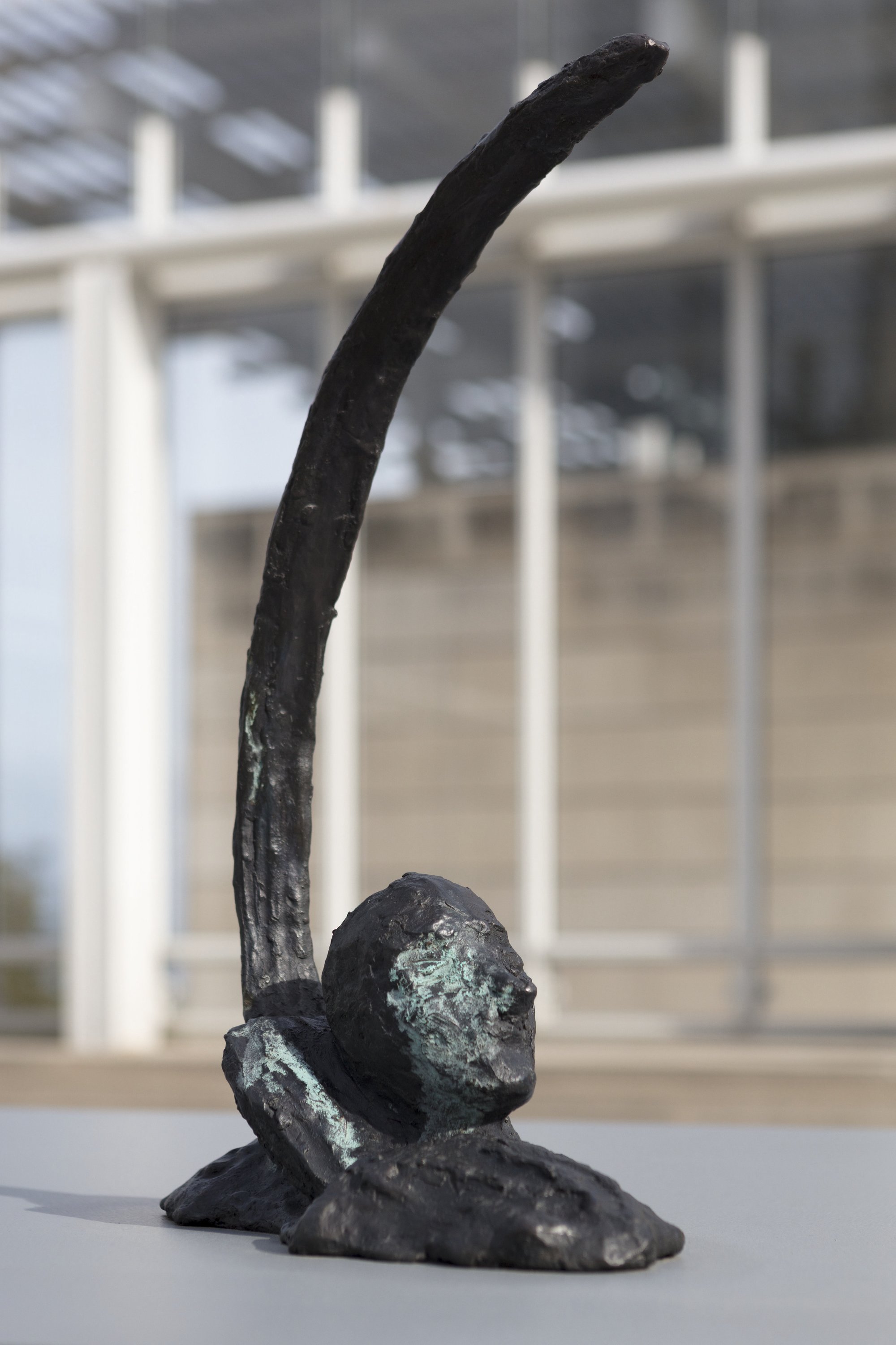 A view of a bronze sculpture in an installation