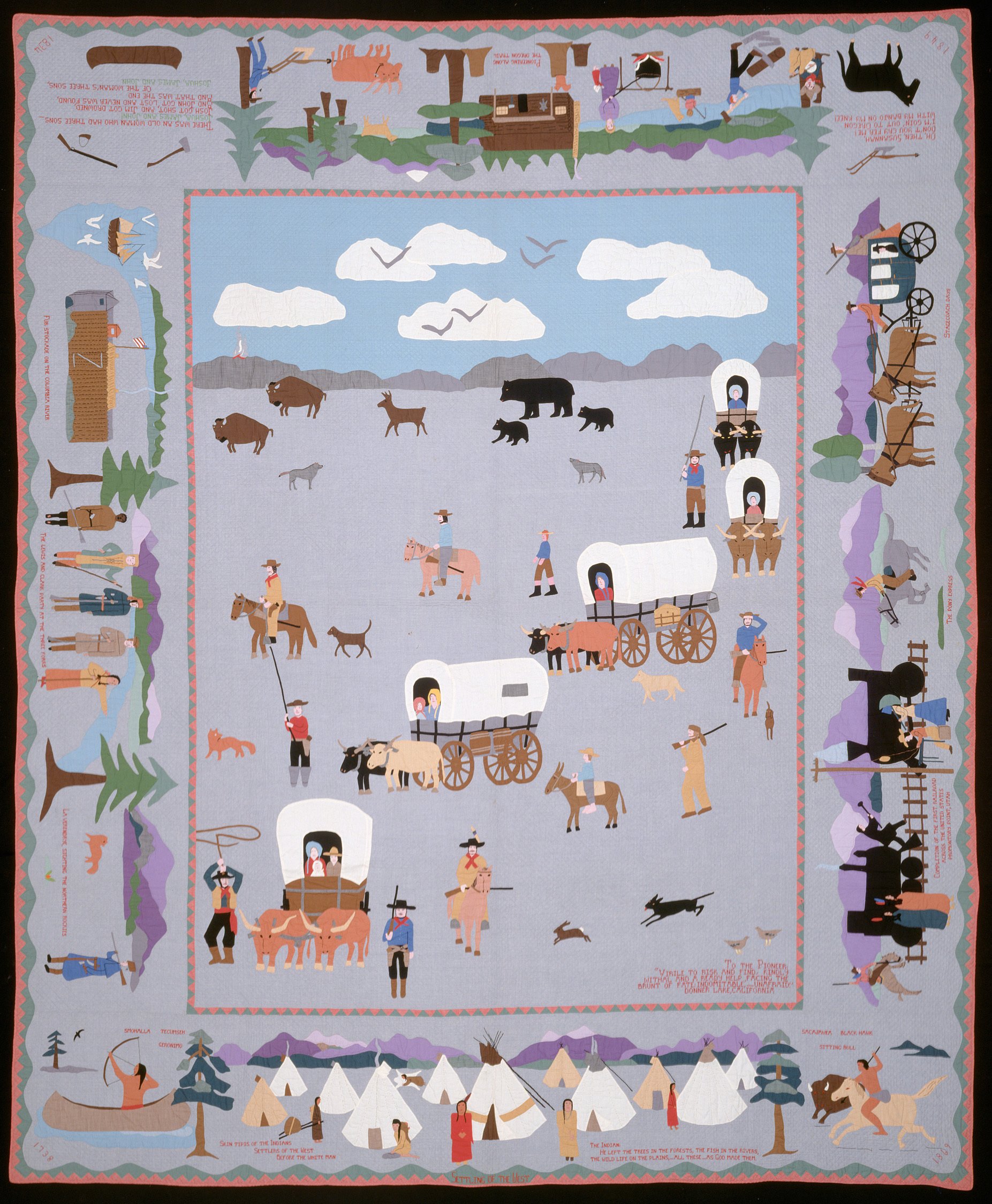 A light purple quilt decorated with scenes of the settling of the West.