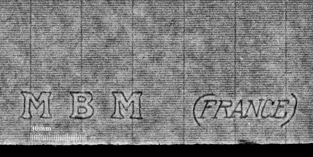Top area is light gray with fine horizontal lines and faint vertical stripes. Centered toward the lower half, large dark-outlined letters read M, B, M, followed by (FRANCE) from left to right. At the bottom-left, a white measurement scale labeled 30mm with small tick marks is visible, and the bottom edge forms a rough black band.