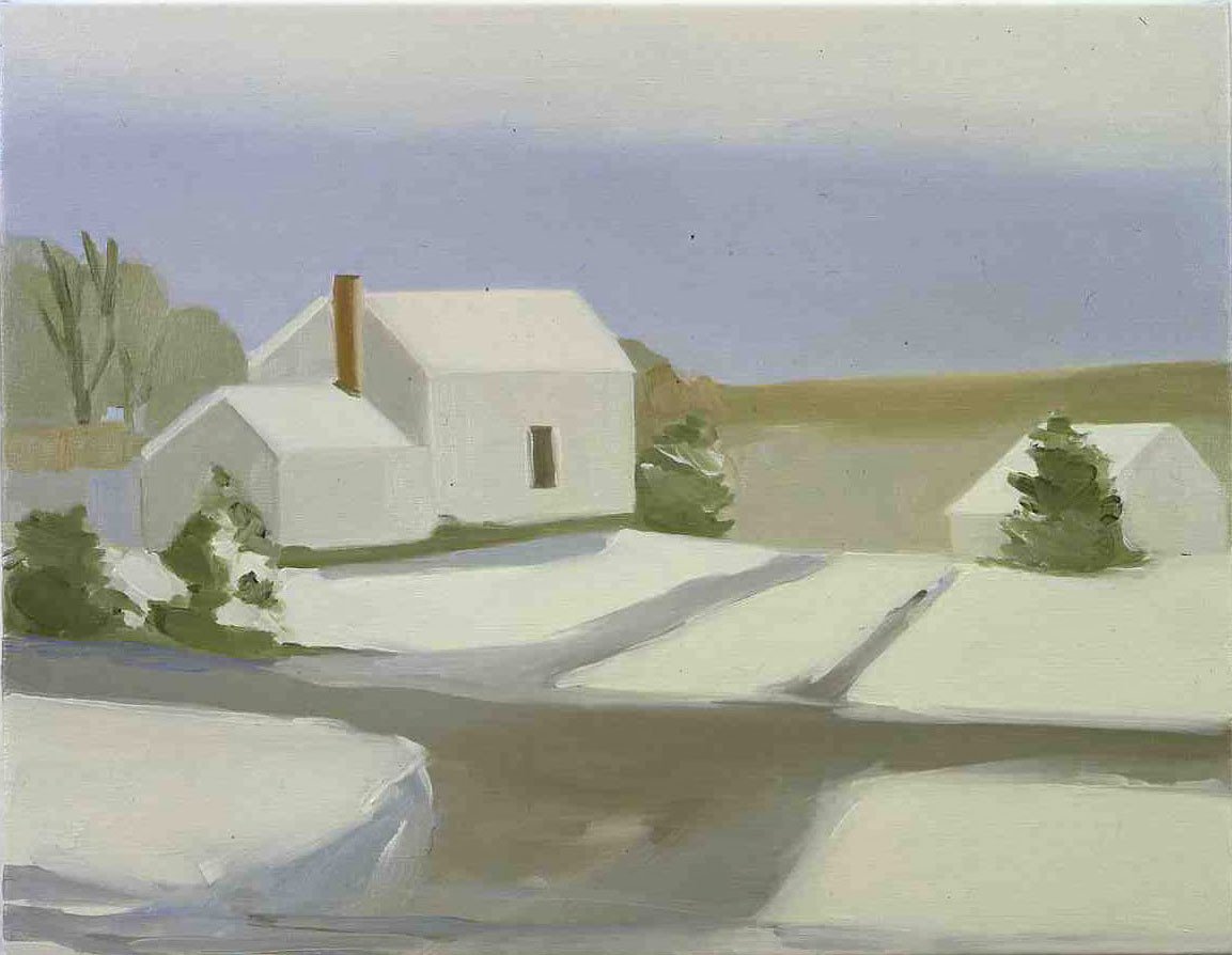 A white house is covered in snow