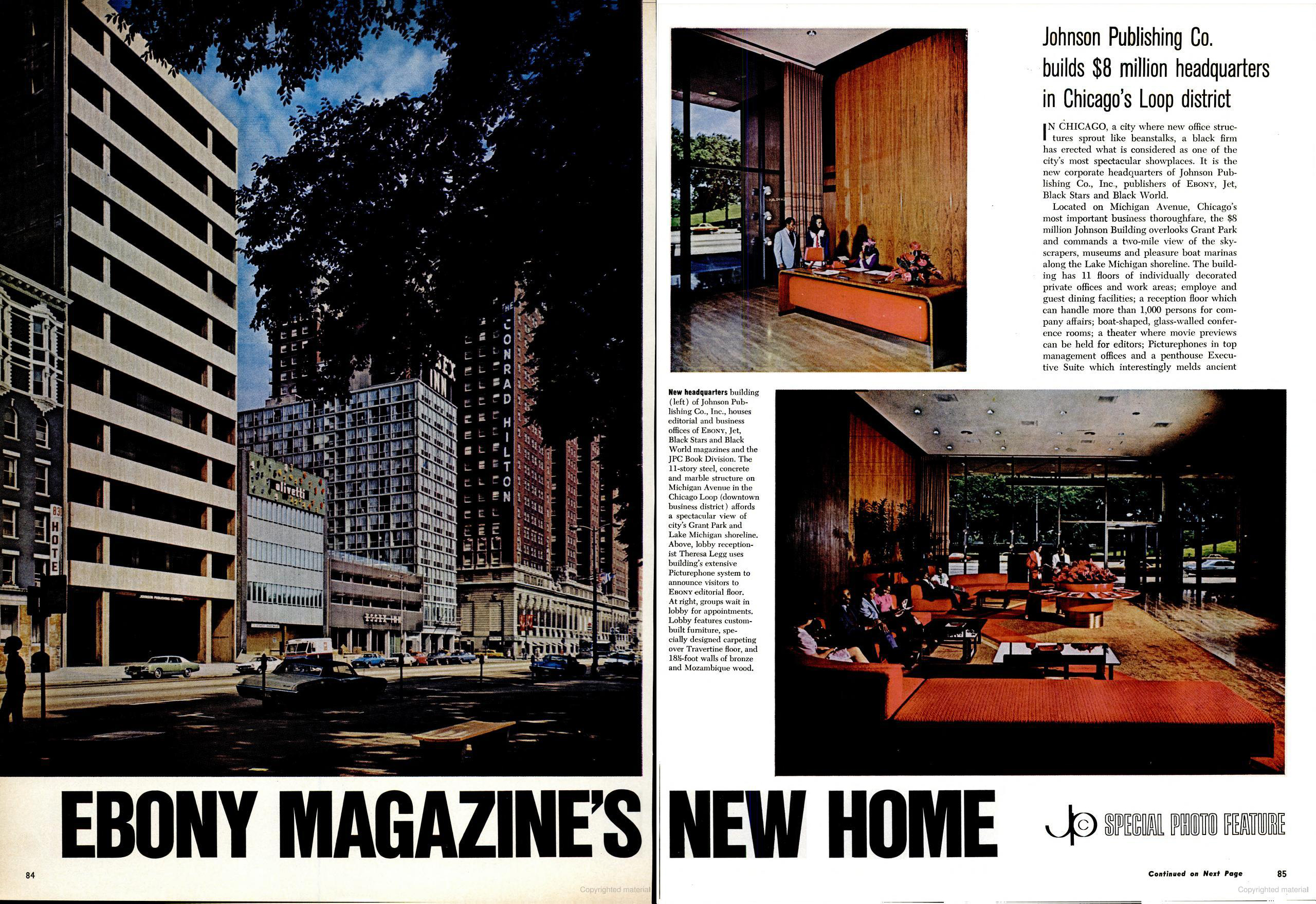 Magazine spread with headline “Ebony Magazine’s New Home,” featuring an exterior and interior view of Johnson Publishing Company’s new headquarters. The left page shows a street-level photo of the modernist 11-story building with a smooth concrete facade, located on Michigan Avenue in Chicago’s Loop, alongside surrounding buildings including the Conrad Hilton Hotel. The right page features two interior photos: one of a front reception desk with wood-paneled walls and a seated receptionist, and one of a lounge area with modern orange furniture and large windows. A text block describes the $8 million building’s amenities and significance.