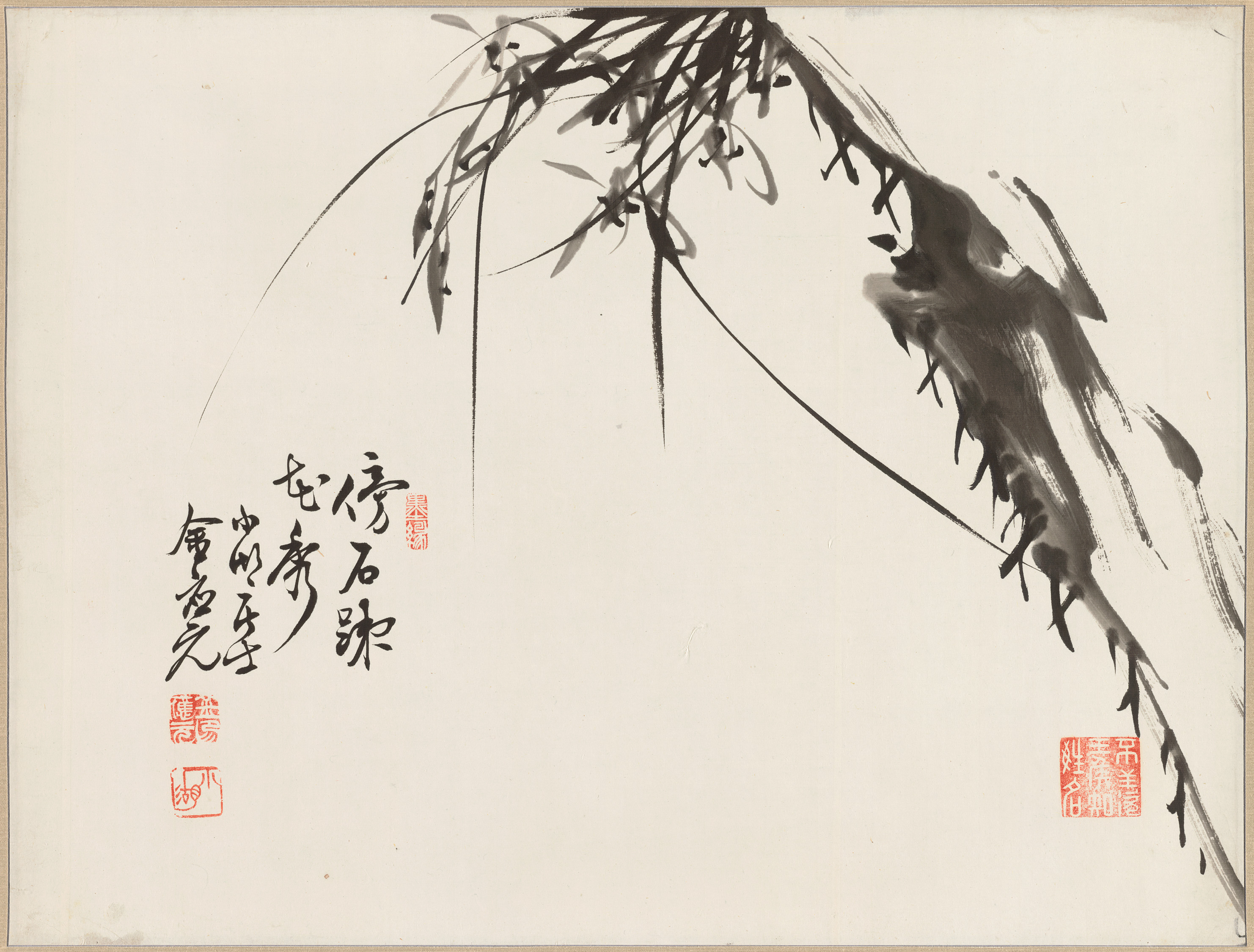 Ink painting of orchids with writing in Korean on the left of the paper.