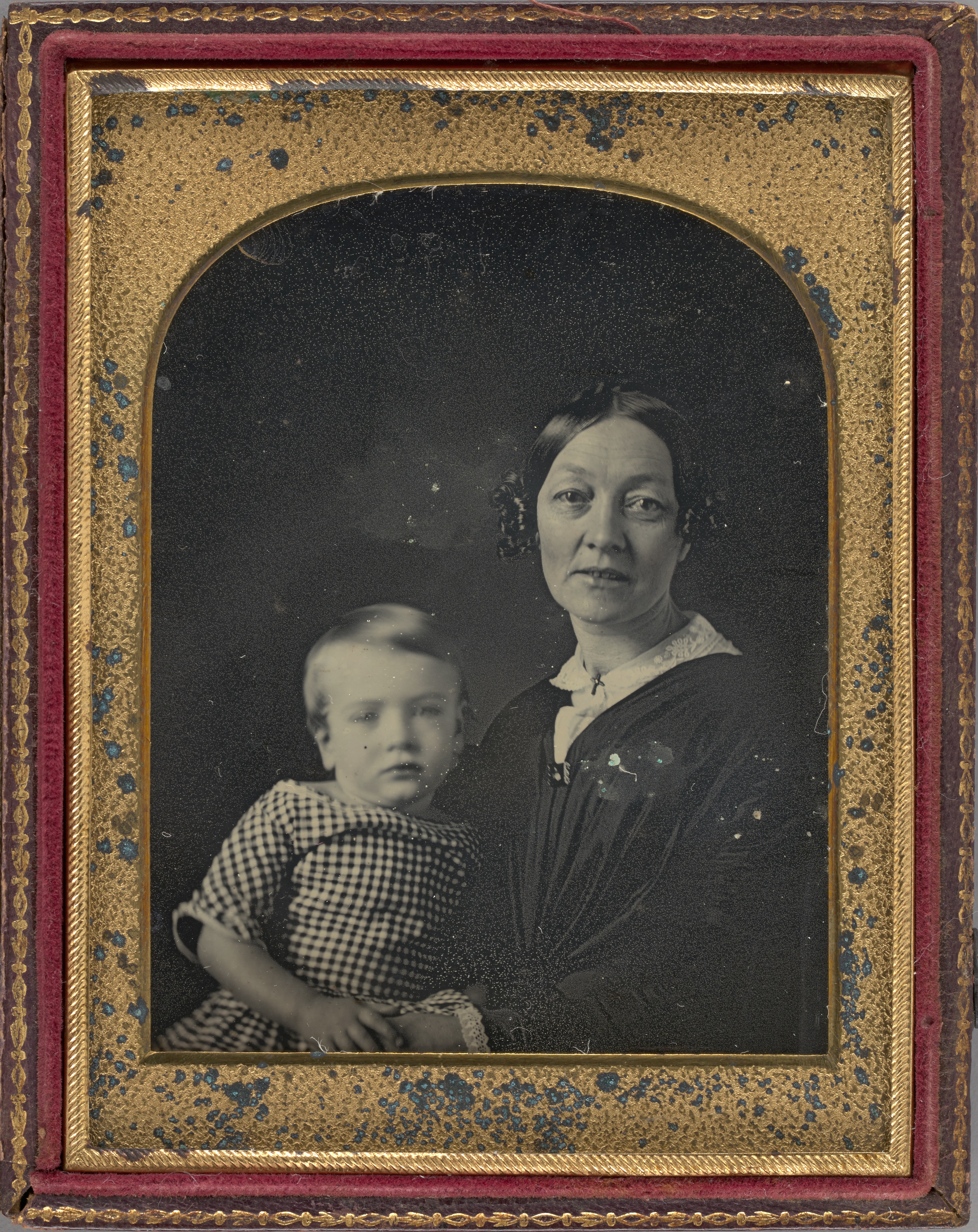 Portrait of mother and toddler from